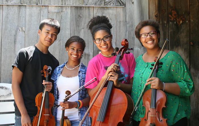 A student quartet from Community MusicWorks at Apple Hill